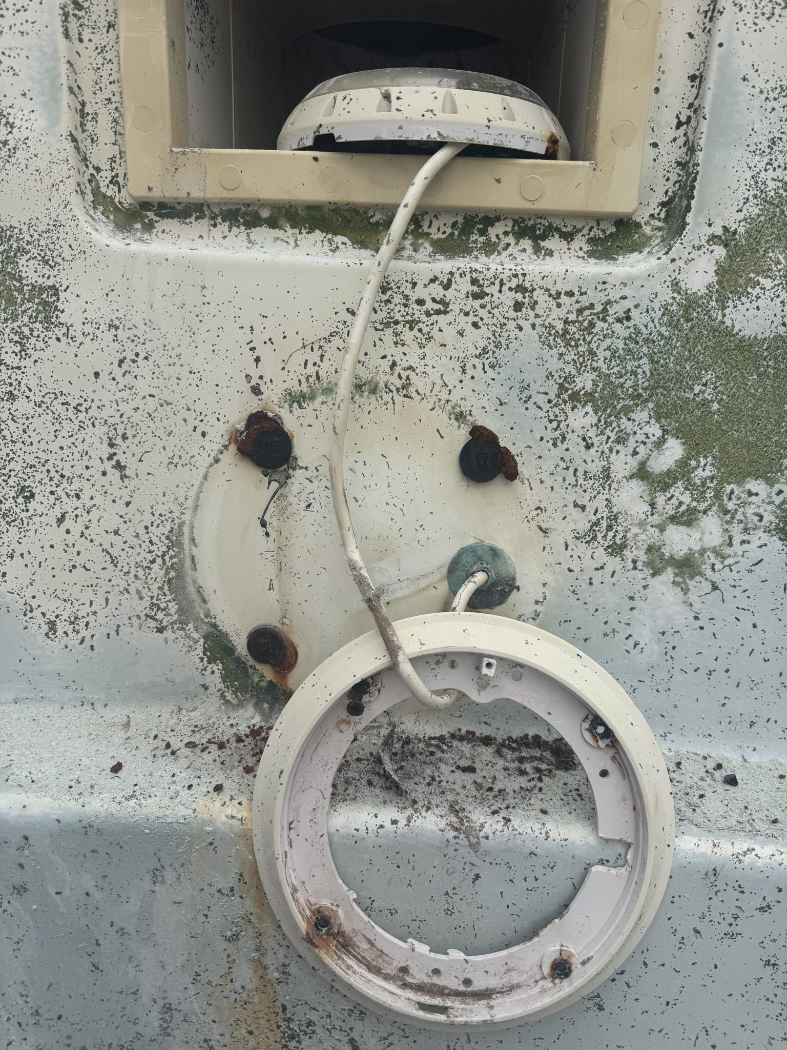 Old skimmer box and fitting stained and worn before renewal