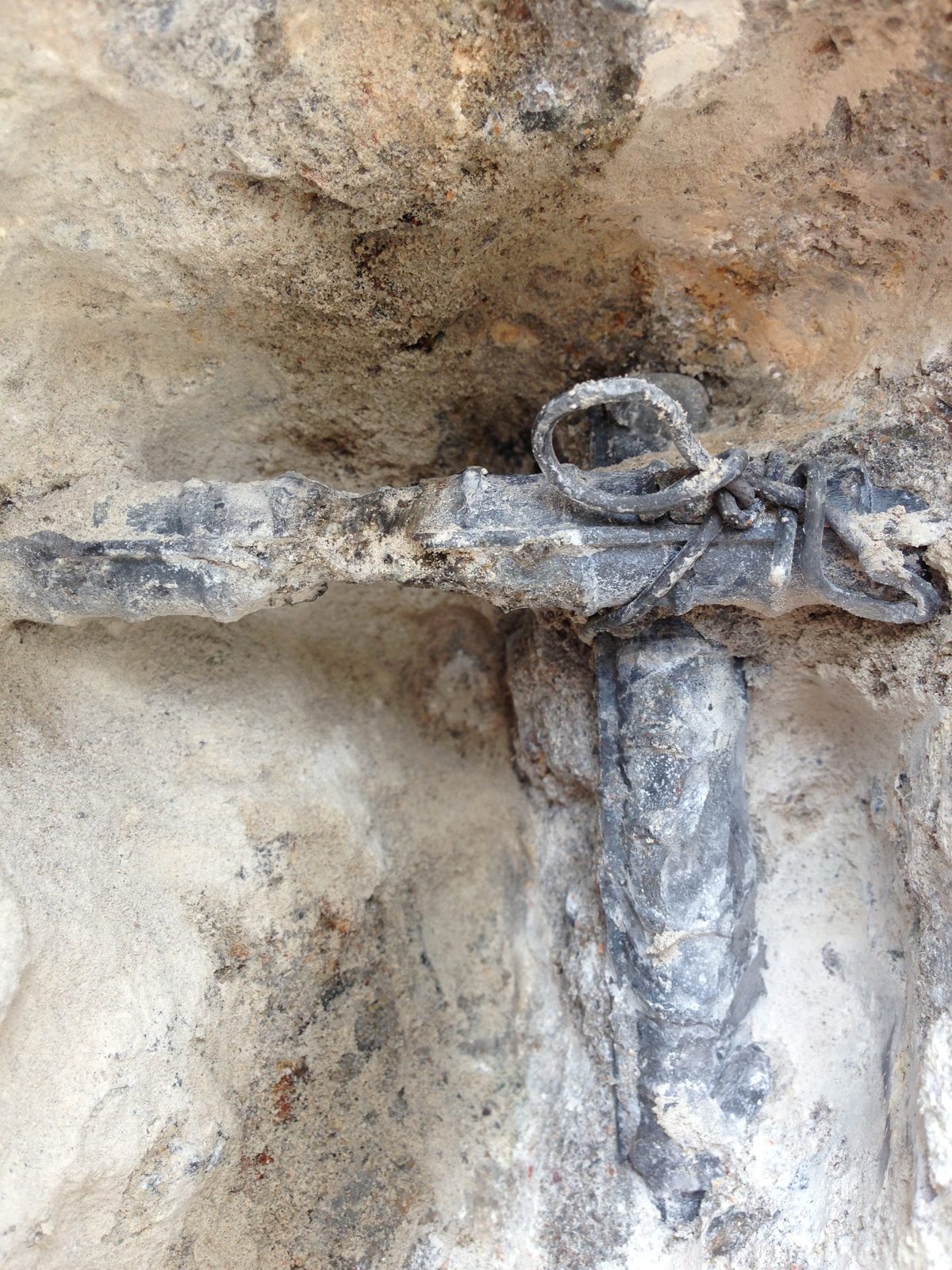 Corroded pool pipe exposed during leak repair